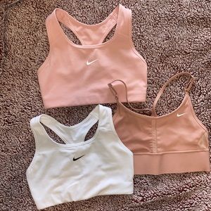 3 pack NIKE sports bras size small: white, mauve, light pink